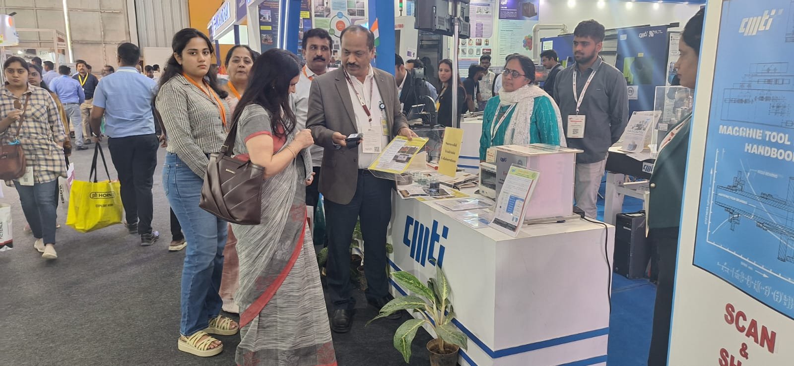 Technical Discussion at CMTI Booth